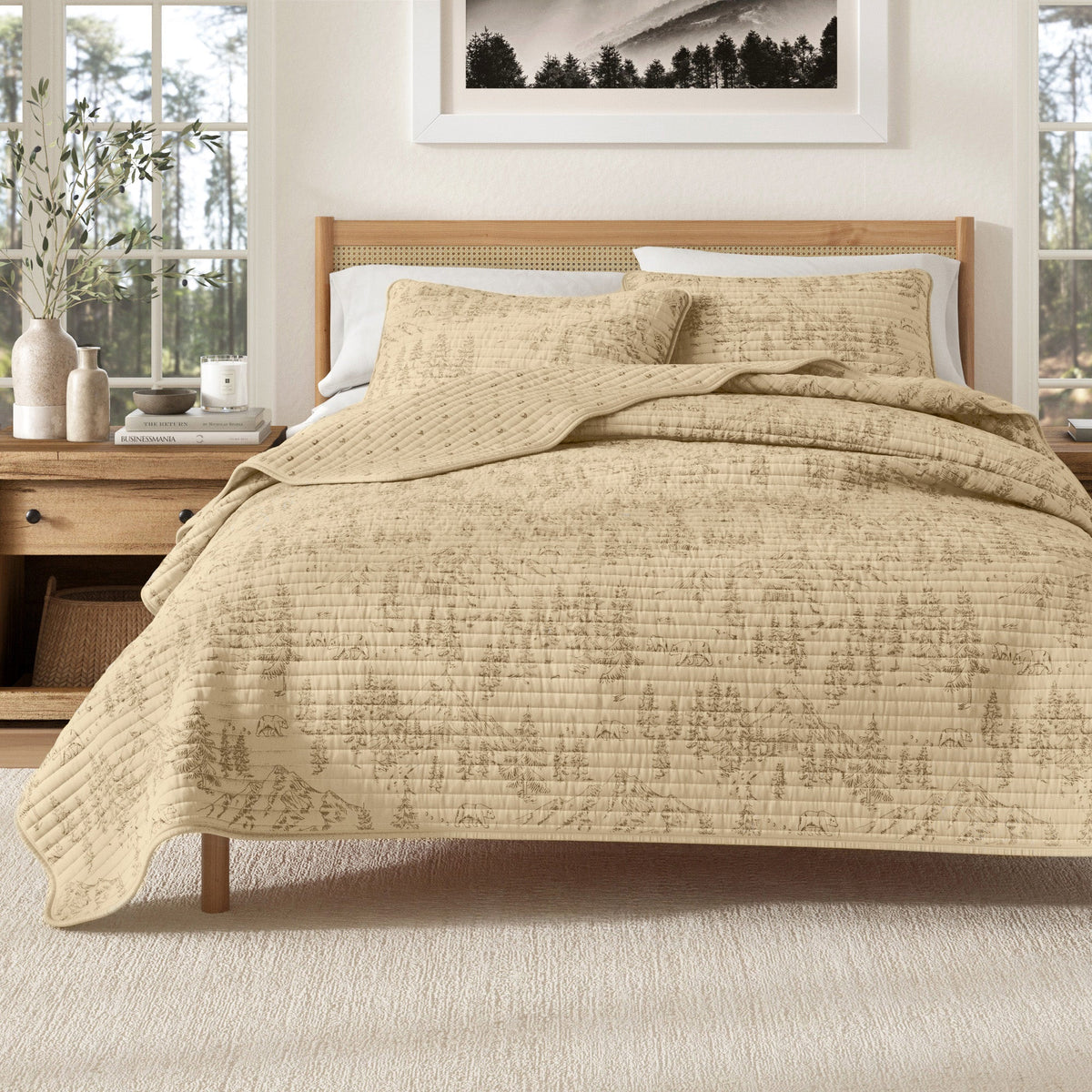 Mountain quilt on a bed